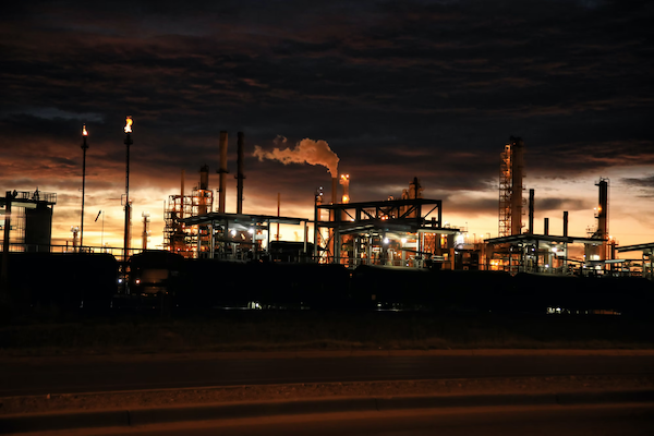 shot of refinery at night