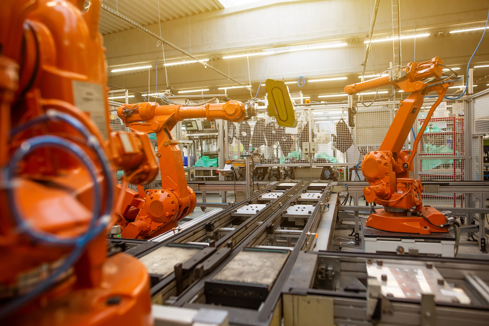 robotic arms in a factory