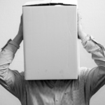 person with box over their head
