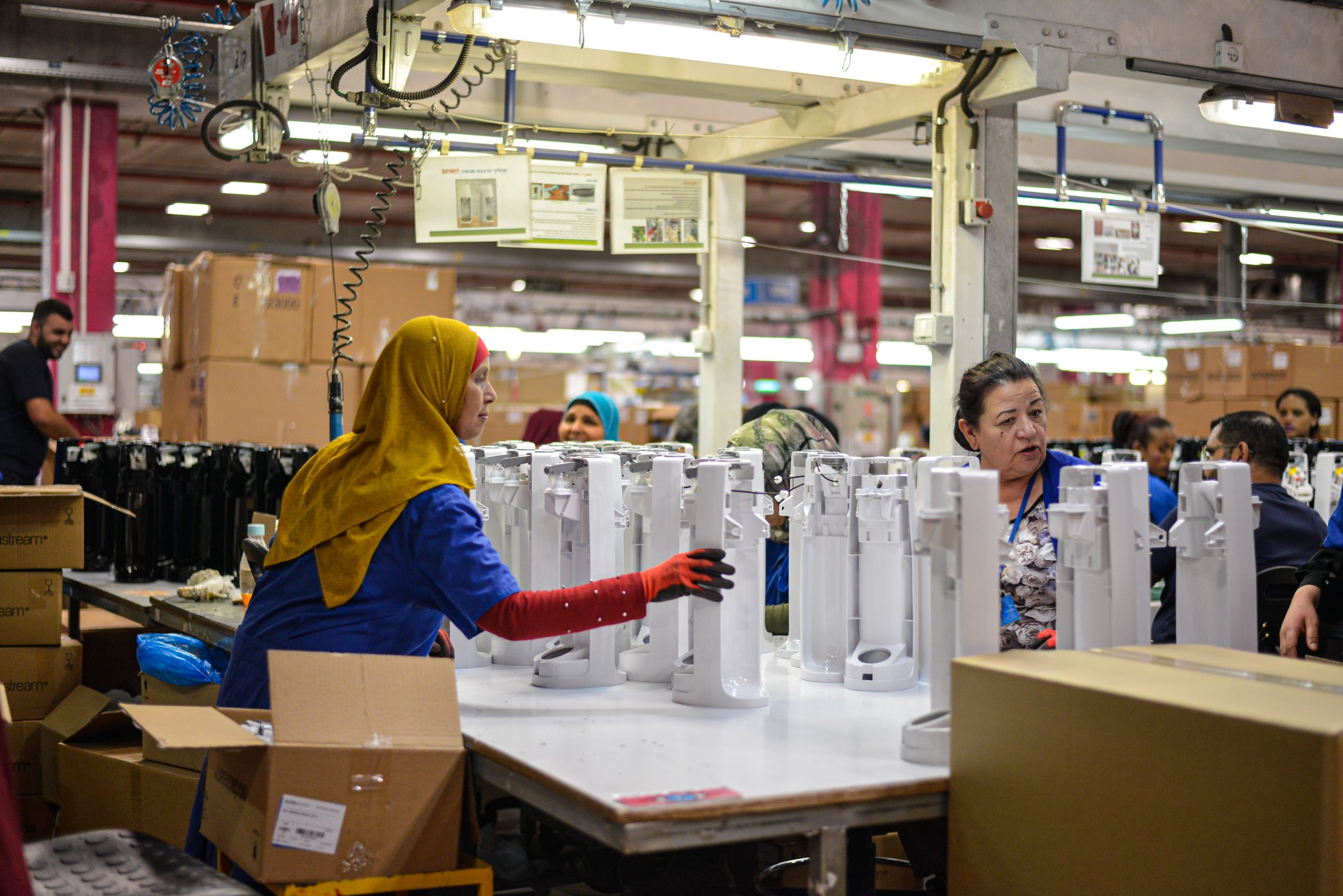 factory workers assembling products